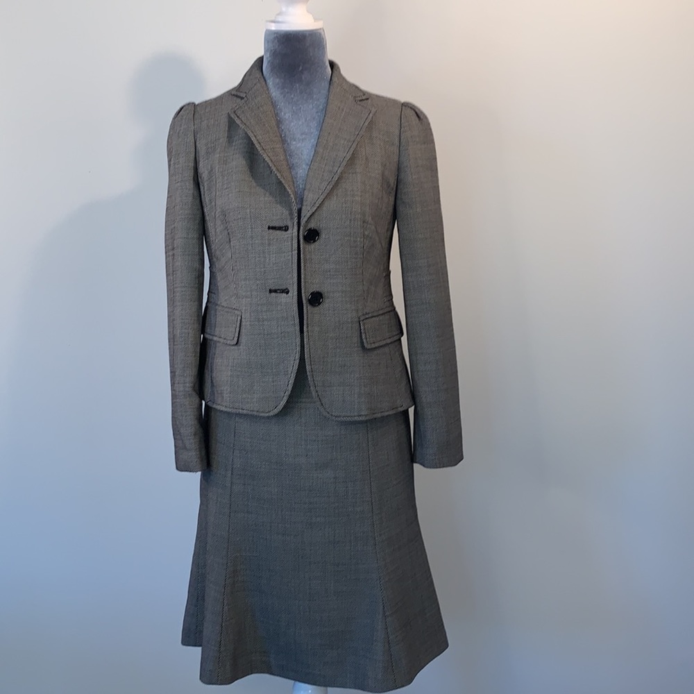 Banana Republic black and white tweed suit jacket with skirt to match.